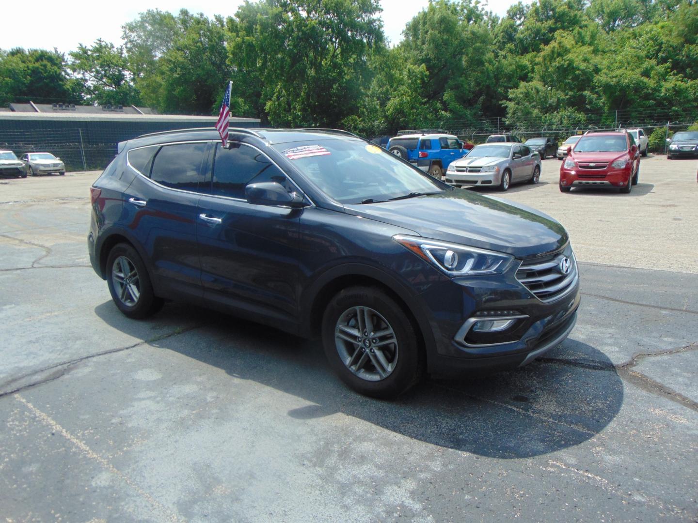 2017 Gray Hyundai Santa Fe Sport (5XYZU3LB2HG) with an 4-Cyl GDI 2.4 Liter engine, Auto, 6-Spd Shiftronic transmission, located at 2105 Dixie Hwy, Louisville, KY, 40210, (502) 772-3333, 38.220932, -85.795441 - Photo#3